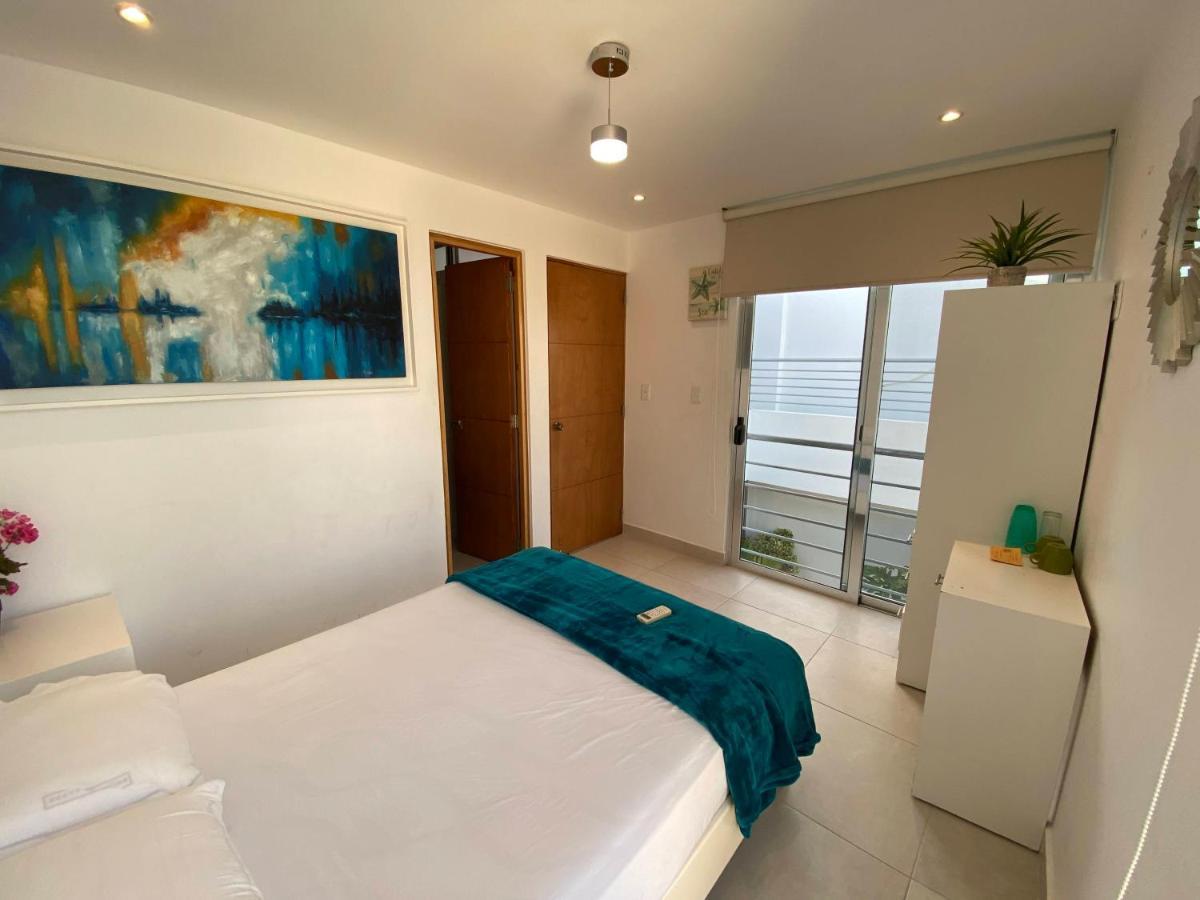 איסלה מוחרס Arrecife Apartments מראה חיצוני תמונה