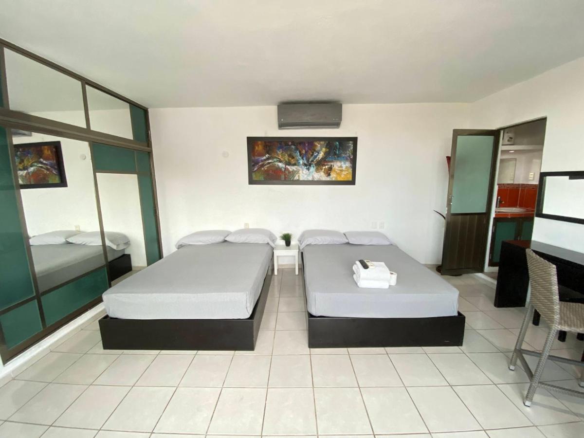 איסלה מוחרס Arrecife Apartments מראה חיצוני תמונה
